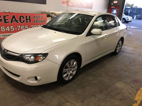 2010 Subaru Impreza for sale at BEACH AUTO GROUP LLC in Bunnell FL