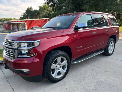 2015 Chevrolet Tahoe for sale at Azteca Auto Sales LLC in Des Moines IA