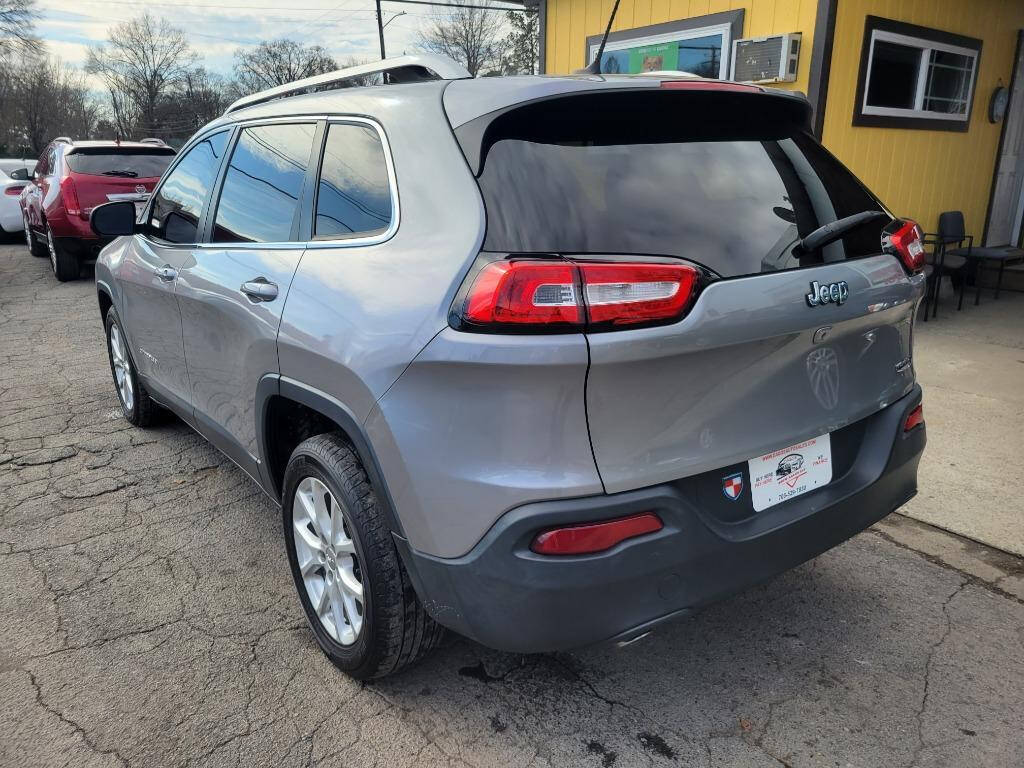 2015 Jeep Cherokee for sale at DAGO'S AUTO SALES LLC in Dalton, GA