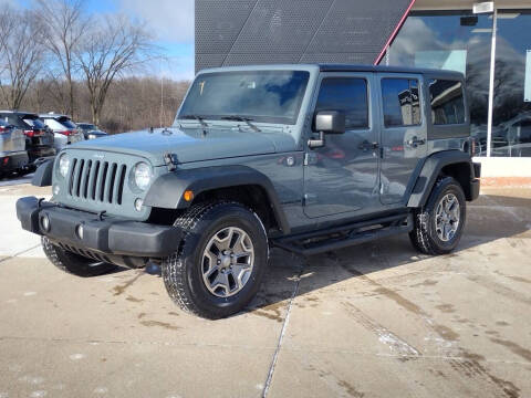 2015 Jeep Wrangler Unlimited for sale at Lasco of Grand Blanc in Grand Blanc MI