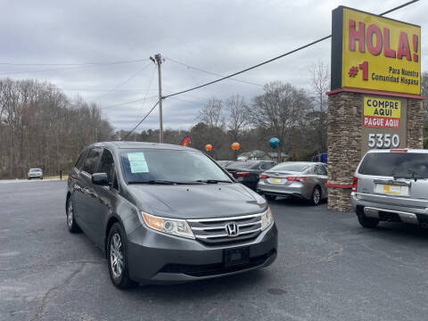 2012 Honda Odyssey for sale at NO FULL COVERAGE AUTO SALES LLC in Austell GA