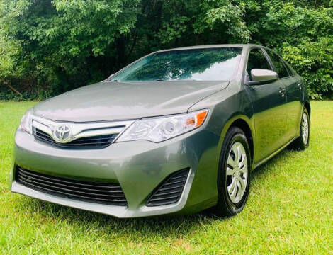 2012 Toyota Camry for sale at Klassic Cars in Lilburn GA