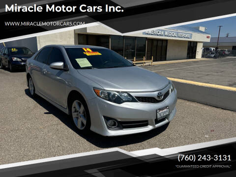 2014 Toyota Camry for sale at Miracle Motor Cars Inc. in Victorville CA