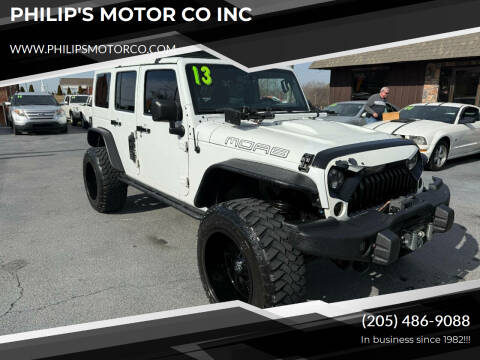 2013 Jeep Wrangler Unlimited for sale at PHILIP'S MOTOR CO INC in Haleyville AL