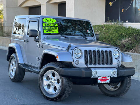 2014 Jeep Wrangler for sale at Esquivel Auto Depot Inc in Rialto CA