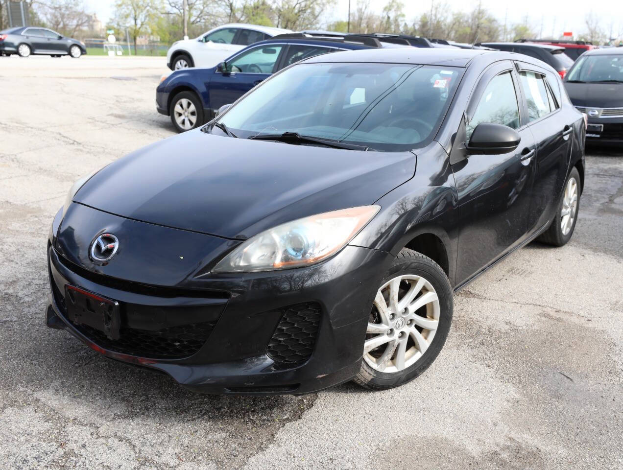 Black 2012 Mazda Mazda3 i Touring i Touring 4dr Hatchback 6A 1