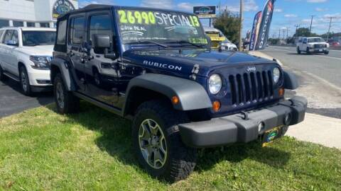 2013 Jeep Wrangler Unlimited for sale at AUTO POINT USED CARS in Rosedale MD