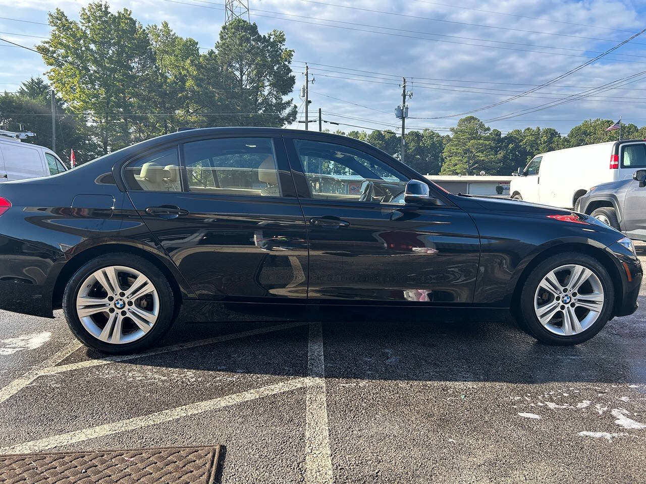 2016 BMW 3 Series for sale at Justin Hughes Auto Group LLC in Douglasville, GA