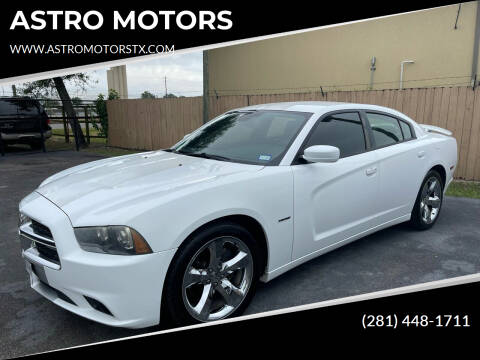 2013 Dodge Charger for sale at ASTRO MOTORS in Houston TX