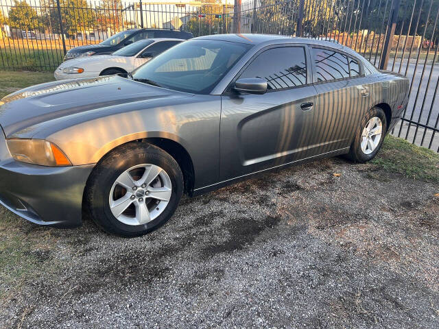 2012 Dodge Charger for sale at Affordable Quality Motors LLC in Houston, TX