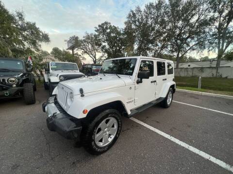 2012 Jeep Wrangler Unlimited for sale at Bay City Autosales in Tampa FL