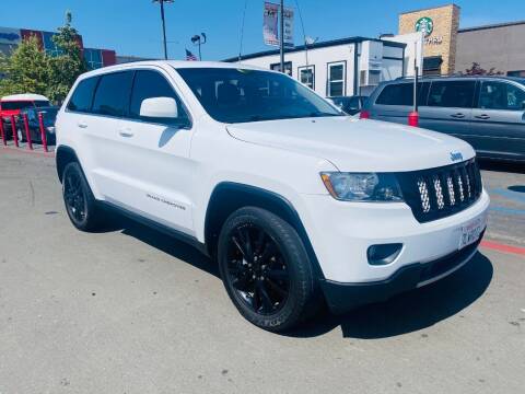 2013 Jeep Grand Cherokee for sale at MILLENNIUM CARS in San Diego CA