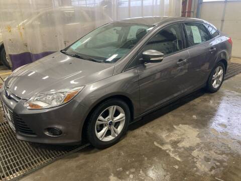 2014 Ford Focus for sale at BERG AUTO MALL & TRUCKING INC in Beresford SD