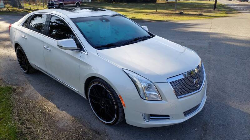 2014 Cadillac XTS for sale at FLAGGS AUTO SOURCE in Mckenna WA