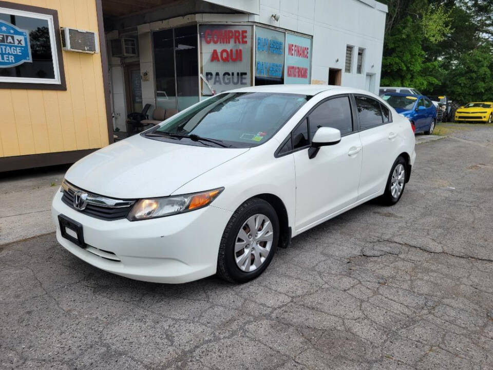 2012 Honda Civic for sale at DAGO'S AUTO SALES LLC in Dalton, GA