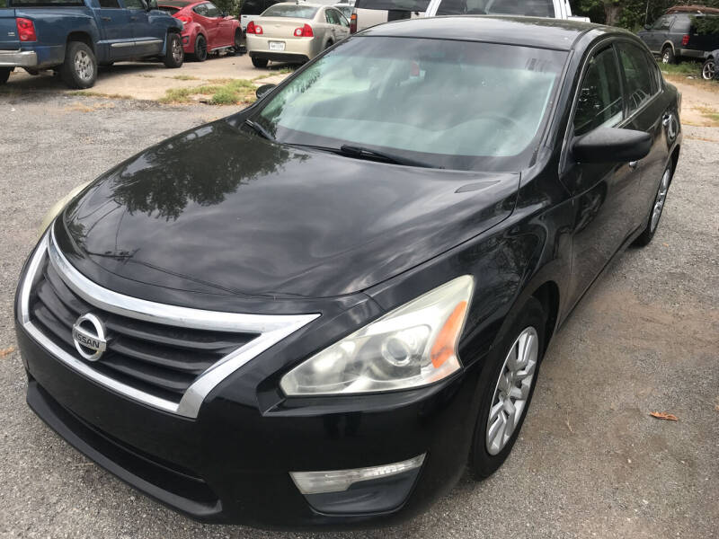 2015 Nissan Altima for sale at Simmons Auto Sales in Denison TX