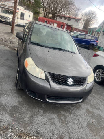 2012 Suzuki SX4 for sale at SAI Auto Sales - Used Cars in Johnson City TN