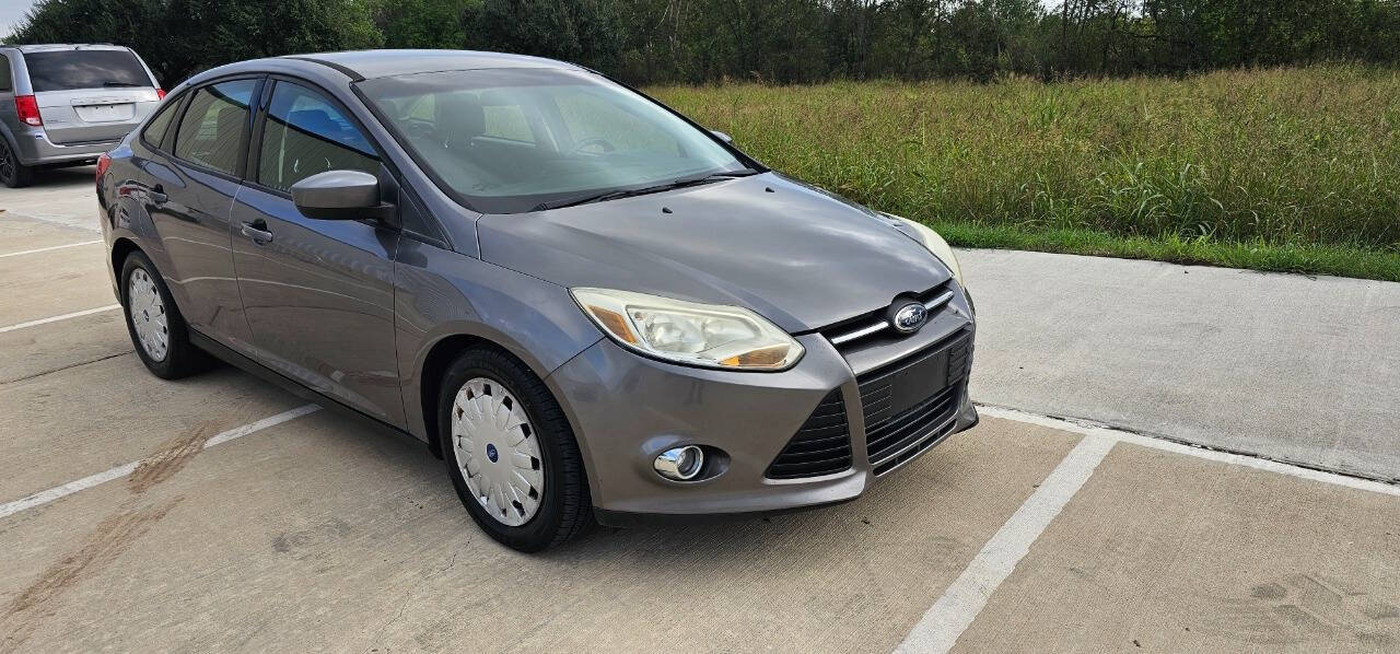 2012 Ford Focus for sale at CAR MARKET AUTO GROUP in Sugar Land, TX