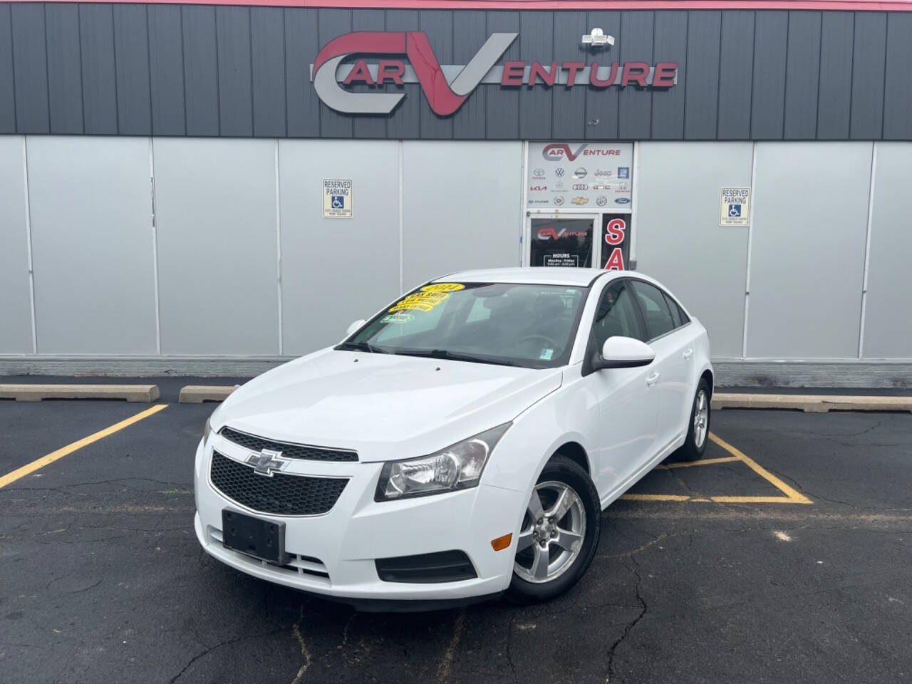 2014 Chevrolet Cruze for sale at Carventure in Lansing, MI