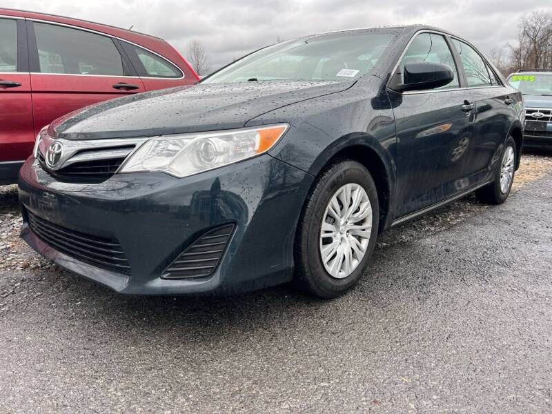 2014 Toyota Camry for sale at Auto Warehouse in Poughkeepsie NY