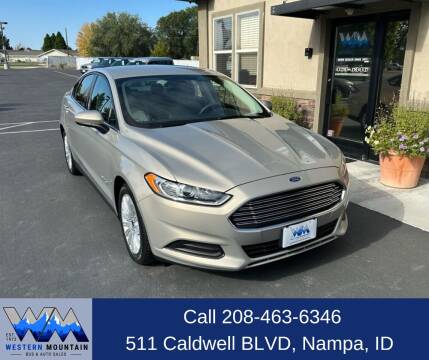 2015 Ford Fusion Hybrid for sale at Western Mountain Bus & Auto Sales in Nampa ID