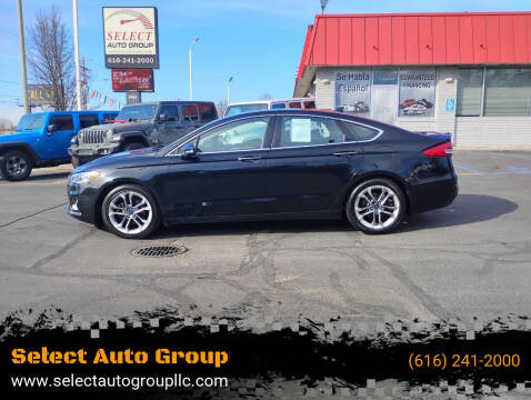 2020 Ford Fusion Hybrid for sale at Select Auto Group in Wyoming MI