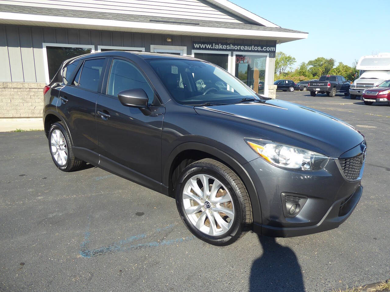 2014 Mazda CX-5 for sale at Lakeshore Autos in Holland, MI