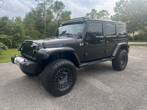 2012 Jeep Wrangler Unlimited for sale at VASS Automotive in Deland FL