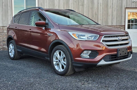 2018 Ford Escape for sale at SMITH FAMILY CAR STORE INC in Roaring Spring PA
