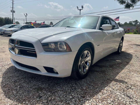 2013 Dodge Charger for sale at CROWN AUTO in Spring TX