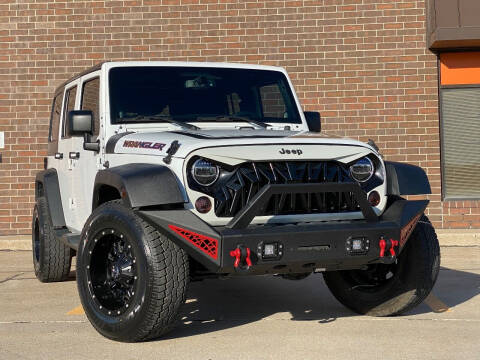 2013 Jeep Wrangler Unlimited for sale at Effect Auto in Omaha NE