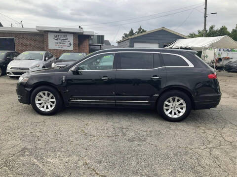 2015 Lincoln MKT Town Car for sale at Autocom, LLC in Clayton NC