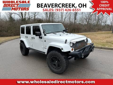 2013 Jeep Wrangler Unlimited for sale at WHOLESALE DIRECT MOTORS in Beavercreek OH