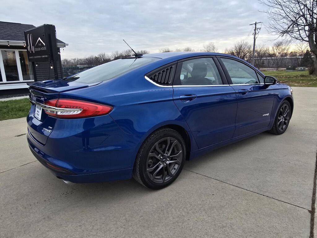 2018 Ford Fusion Hybrid for sale at Bigfoot Auto in Hiawatha, IA