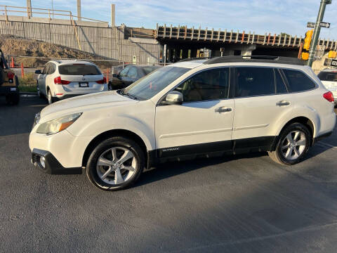 2013 Subaru Outback for sale at McManus Motors in Wheat Ridge CO