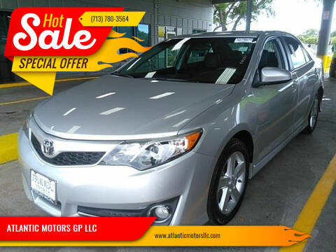2014 Toyota Camry for sale at ATLANTIC MOTORS GP LLC in Houston TX