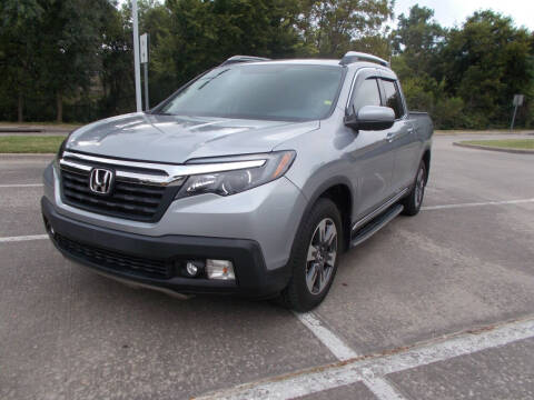 2017 Honda Ridgeline for sale at ACH AutoHaus in Dallas TX