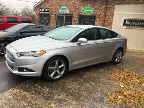 2014 Ford Fusion for sale at The Car Lot in Bessemer City NC