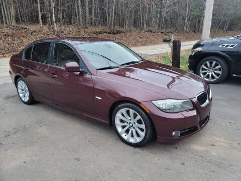 2009 BMW 3 Series for sale at GEORGIA AUTO DEALER LLC in Buford GA