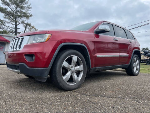 2011 Jeep Grand Cherokee for sale at Jim's Hometown Auto Sales LLC in Byesville OH