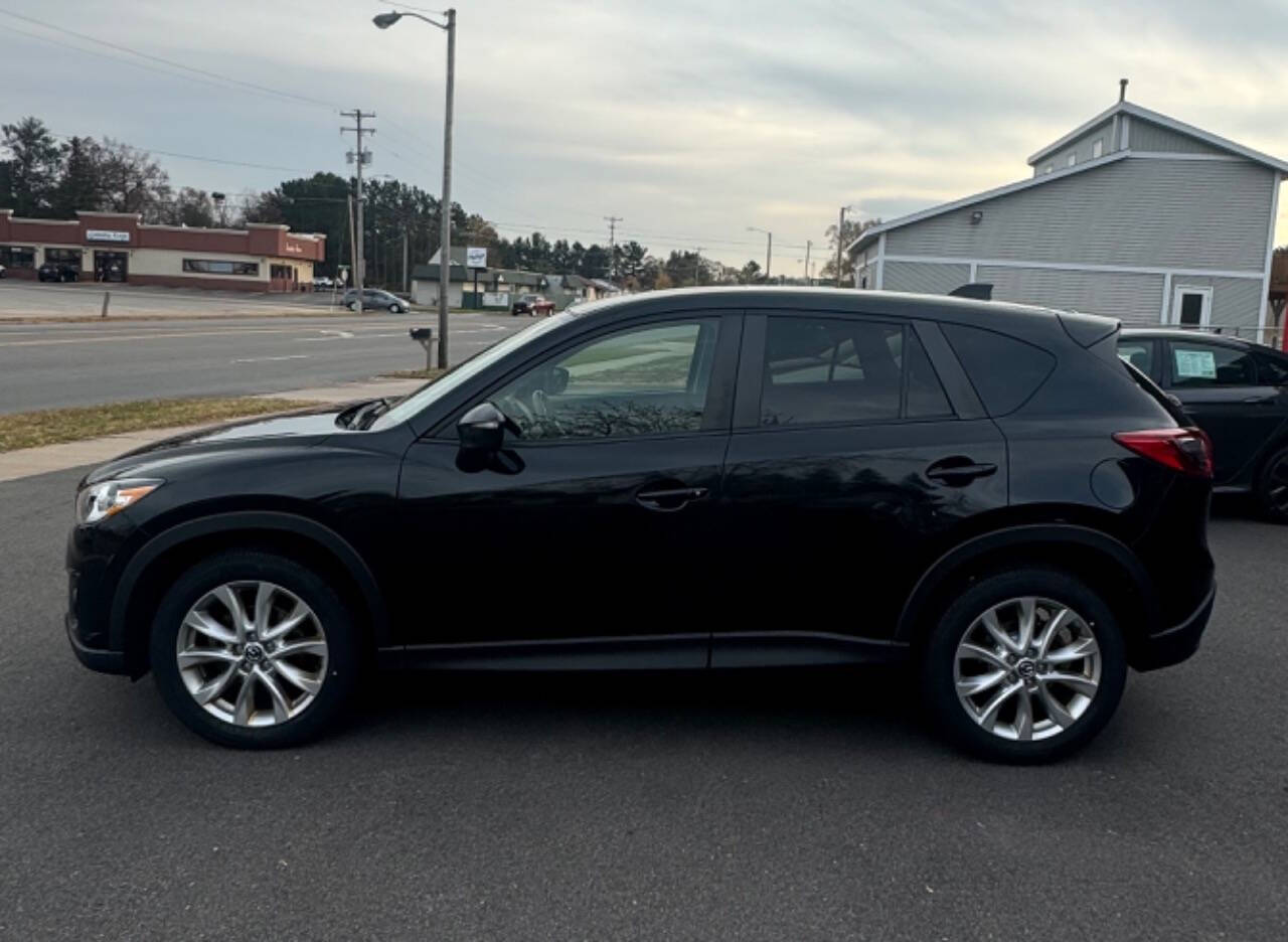 2015 Mazda CX-5 for sale at SIGNATURE AUTOS LLC in Weston, WI