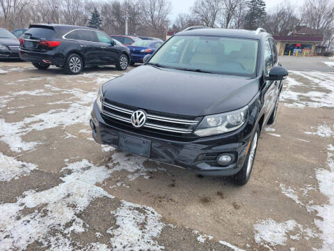 2014 Volkswagen Tiguan for sale at Prime Time Auto LLC in Shakopee MN