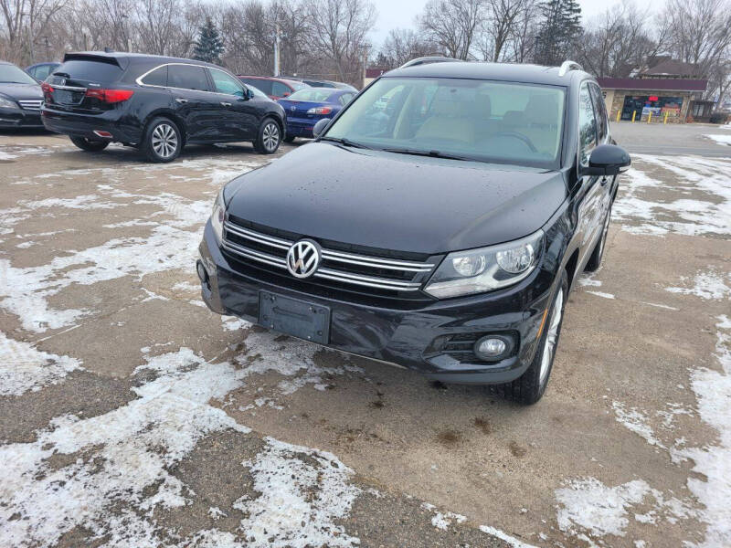 2014 Volkswagen Tiguan for sale at Prime Time Auto LLC in Shakopee MN