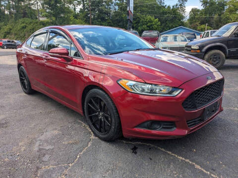 2015 Ford Fusion for sale at TEMPLE AUTO SALES in Zanesville OH