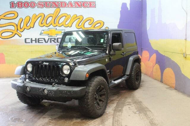 Used 2014 Jeep Wrangler Sport with VIN 1C4AJWAG8EL122840 for sale in Grand Ledge, MI