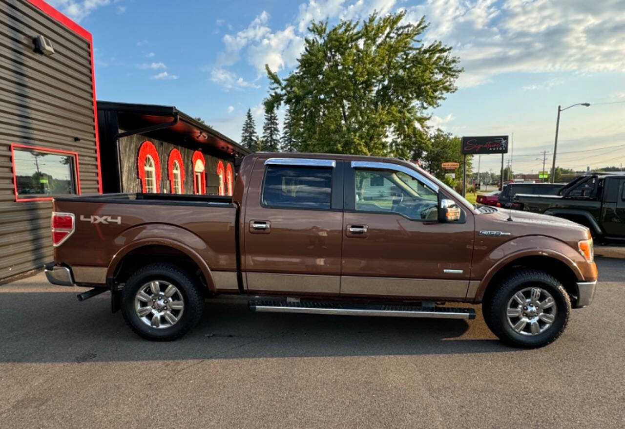 2011 Ford F-150 for sale at SIGNATURE AUTOS LLC in Weston, WI