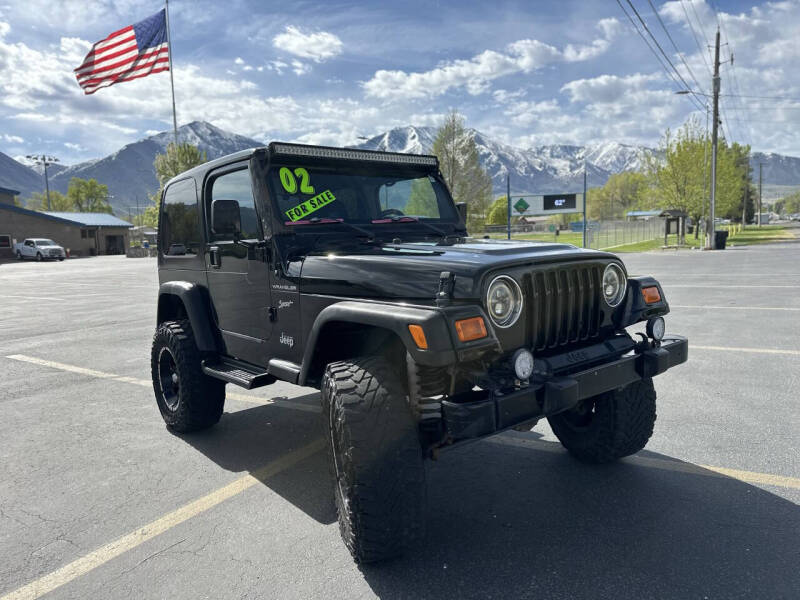 Used 2002 Jeep Wrangler SPORT with VIN 1J4FA49S32P765579 for sale in Salem, UT