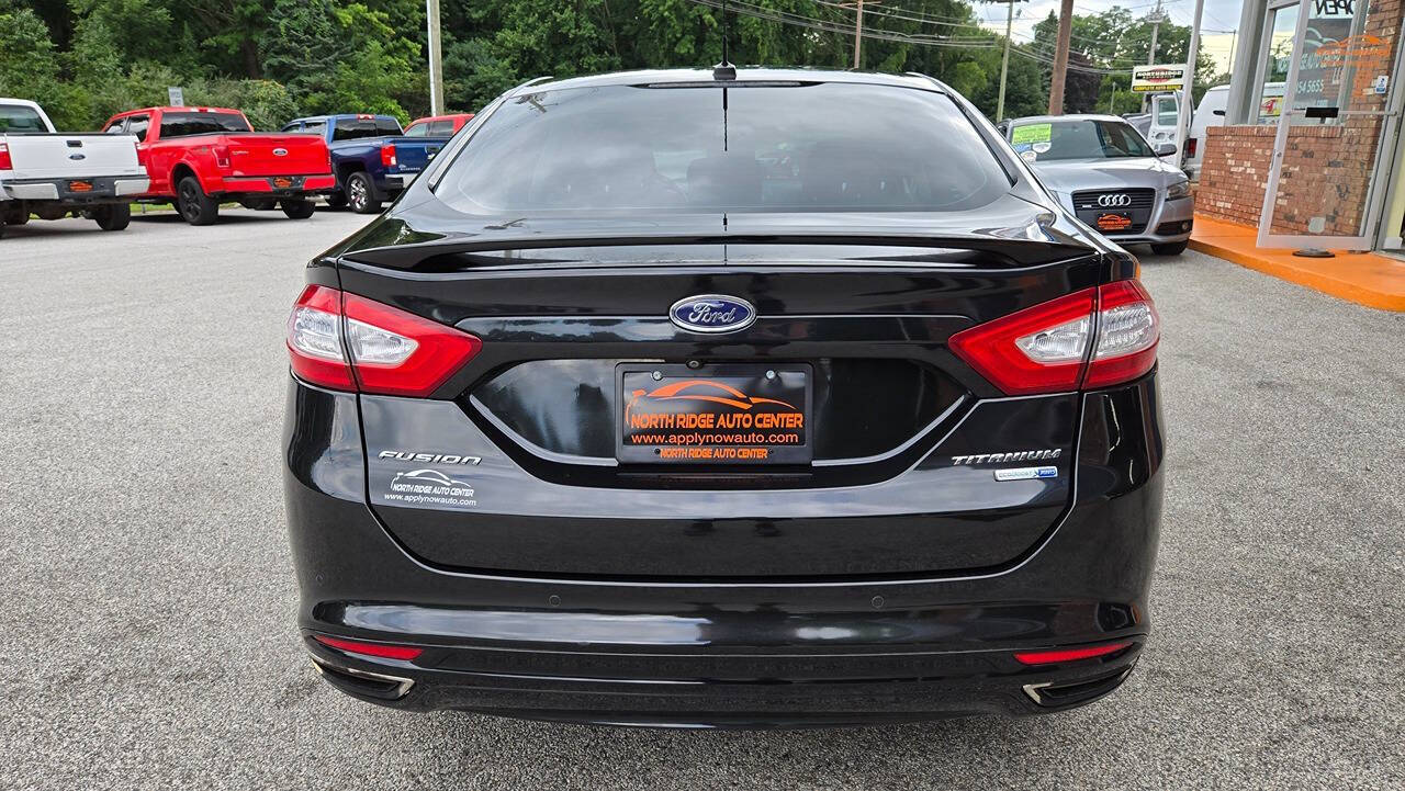 2014 Ford Fusion for sale at North Ridge Auto Center LLC in Madison, OH