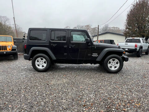 2011 Jeep Wrangler Unlimited for sale at H and S Auto Group in Canton GA