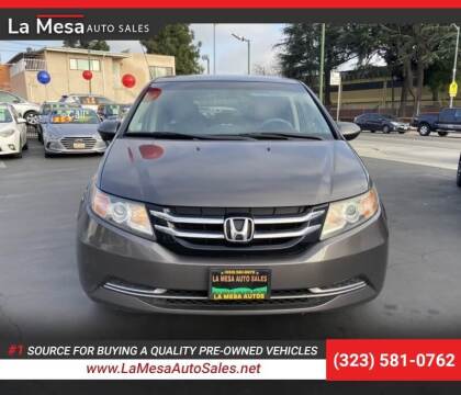 2015 Honda Odyssey for sale at La Mesa Auto Sales in Huntington Park CA